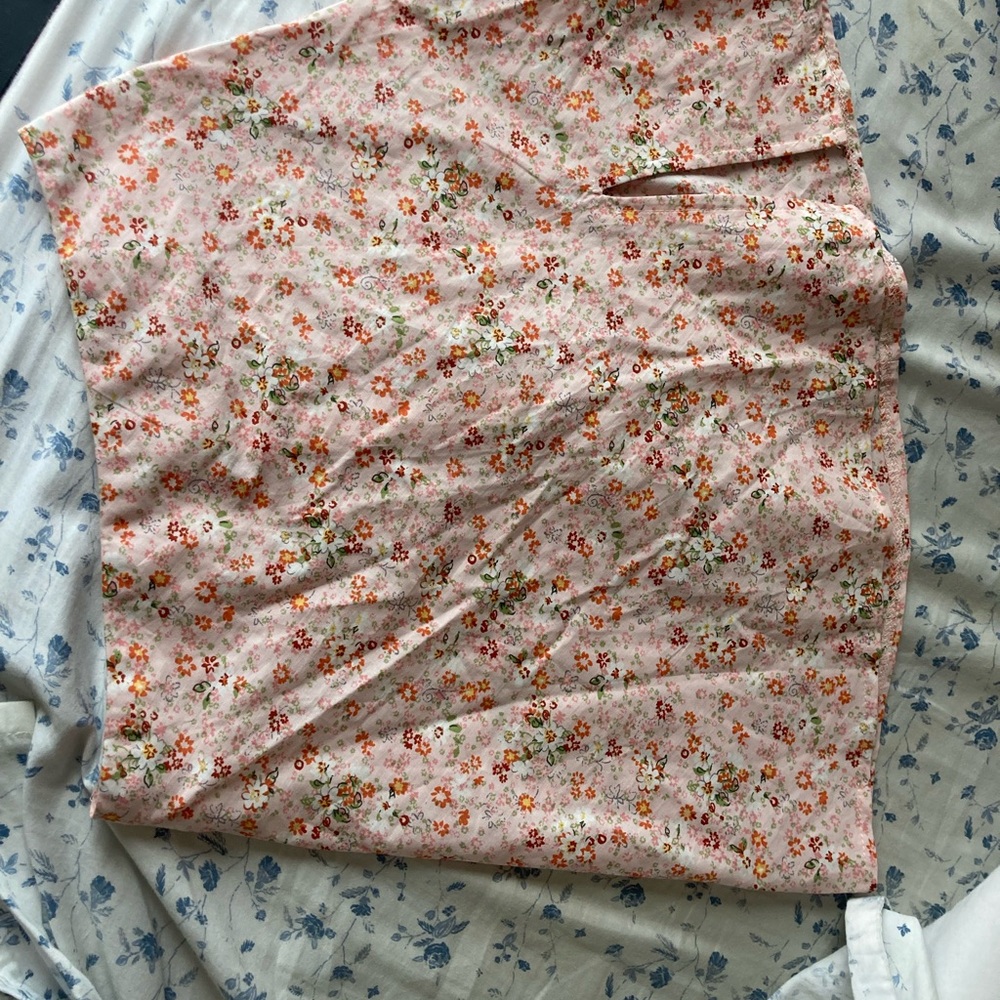Pink princess poly floral mini skirt. Never worn!!